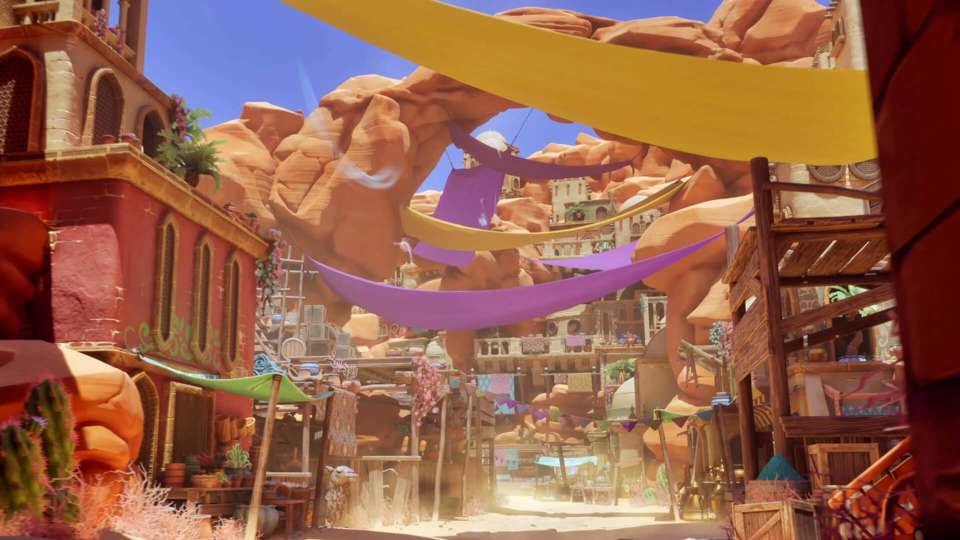 a colourful town street game environment built around red desert rocks