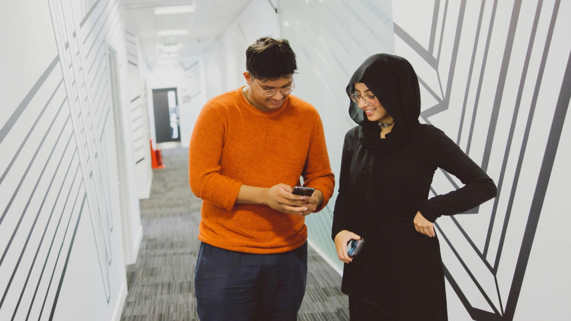 Pair of students in corridor